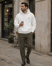Warm white NORVEN Origin Essential Hoodie with olive trousers for a weekend look