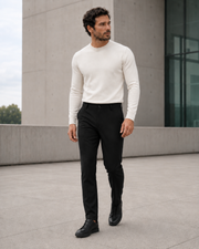 NORVEN Ascent Tailored Trouser in Black styled with a Warm White fine-gauge crewneck