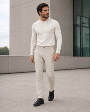 NORVEN Ascent Tailored Trouser in Stone styled with a Warm White fine-gauge crewneck