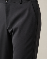 NORVEN Ascent Tailored Trouser in Charcoal, fabric texture and drape detail