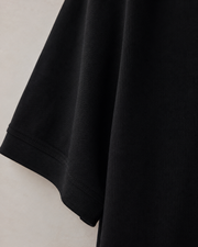 NORVEN Origin Structured Polo in Black, jersey texture detail