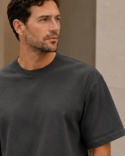 Close-up of the crew neckline and upper fabric of the NORVEN Origin Heavyweight Tee in Charcoal