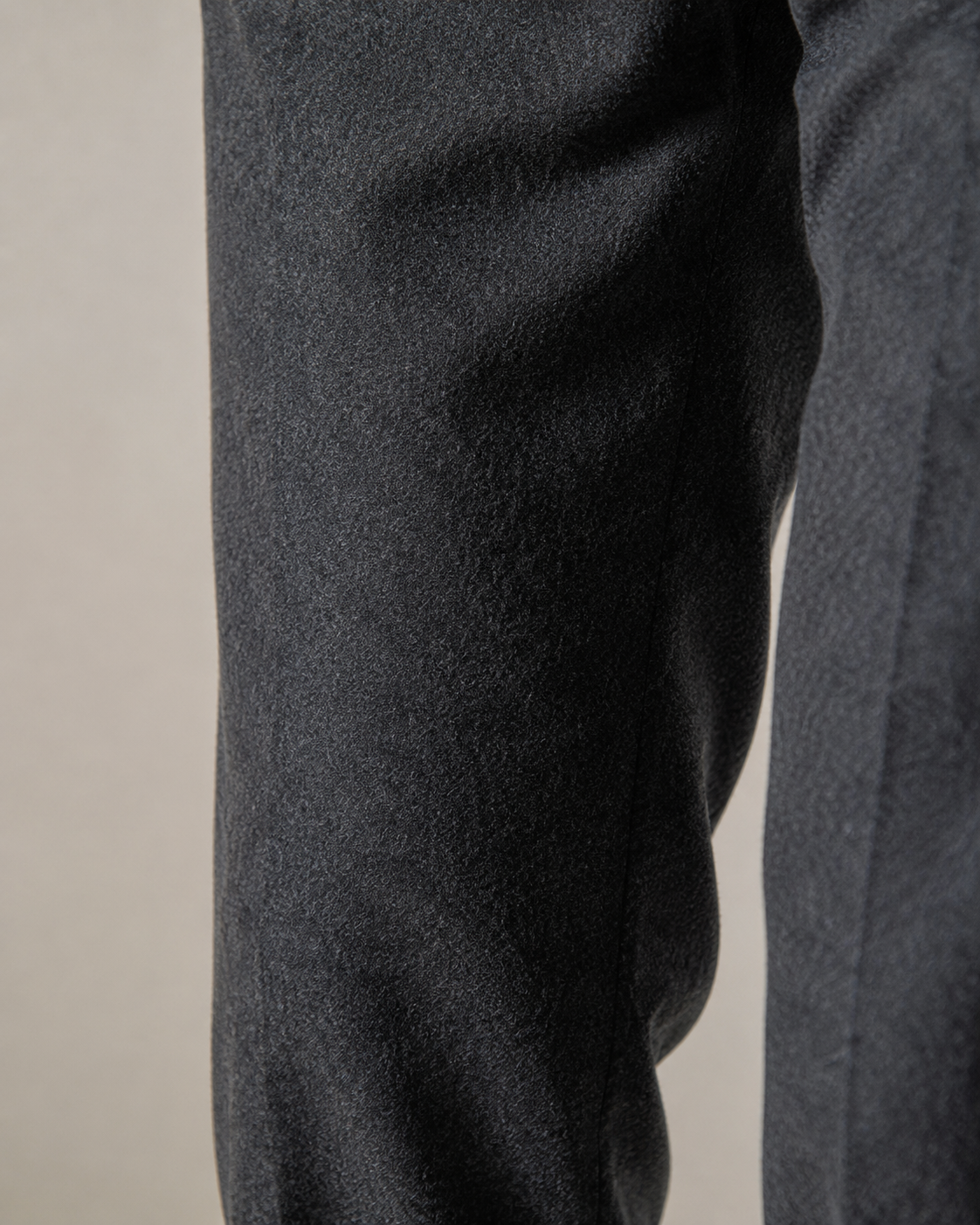NORVEN Elevate Tailored Trouser in Charcoal, fabric texture and drape detail