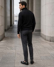 NORVEN Elevate Turtleneck Knit in Black, rear three-quarter view